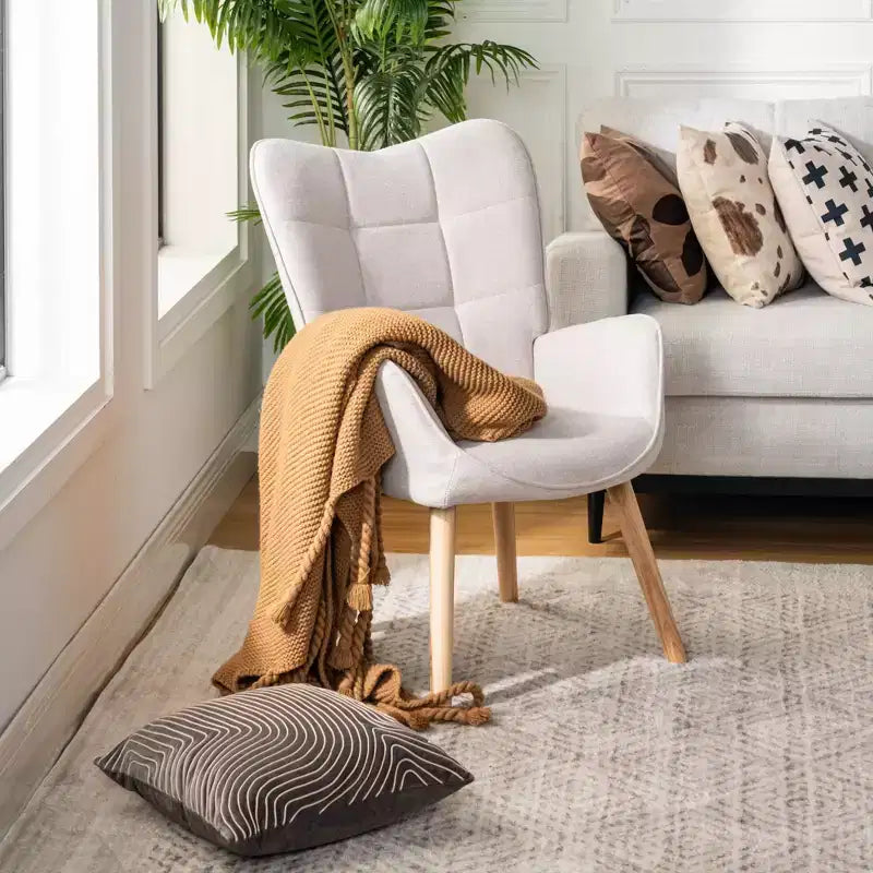 Fauteuil rembourré à dossier ailé touffeté, Fauteuil de salon en tissu, confortable et élégant, avec pieds en bois massif, Beige