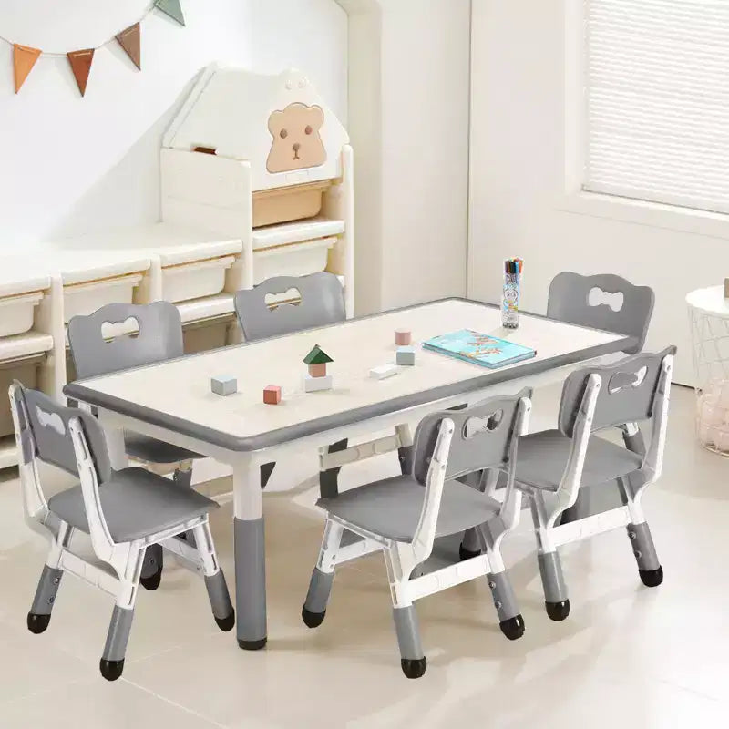 Ensemble table et chaises pour enfants, bureau réglable en hauteur avec 6 sièges pour les 2-10 ans, table d'activités artistiques et manuelles, plateau à graffitis, pieds antidérapants, capacité de 136 kg max.