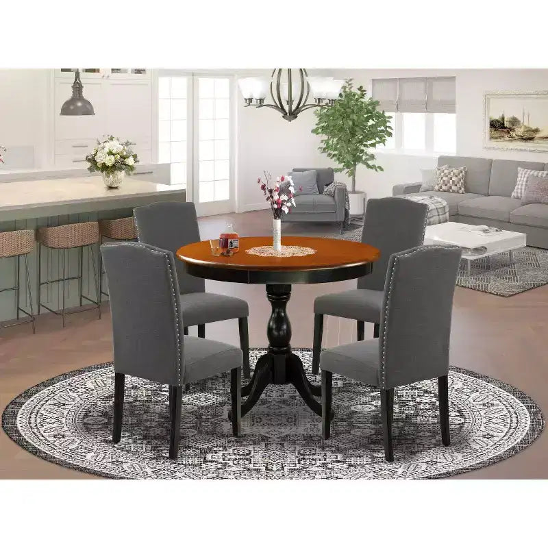Table à manger HomeStock 5 pièces ronde noire et finition cerisier en bois massif avec 4 chaises
